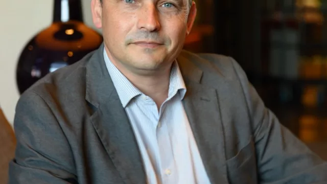 Con Daniel Brignardello, Chief Delivery Officer de Evertec